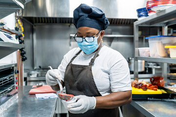 cook preparing to tomato dishes