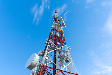radio communication antenna on blue sky background