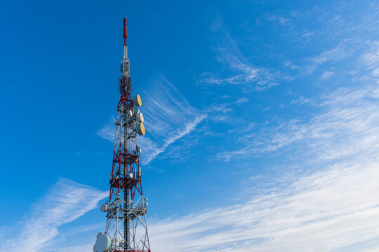 radio communication antenna on blue sky background
