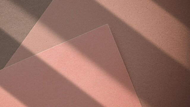 Pink blank papers and sunlight shadows texture, paper stationery on office desk as flatlay background and brand design