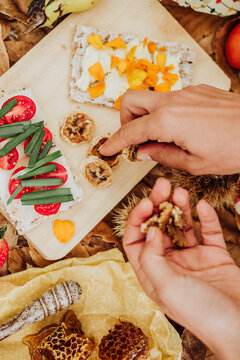 A still life of fruits, honey and cheese in the nature