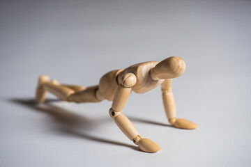 wooden man on white background. Concept