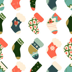 Hand drawn vector illustration of warm winter and autumn woolen socks in Scandinavian style, executed as a vector seamless pattern. Trendy flat design elements for winter clothing.