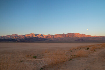 Morning light sunrise at the pristine salt flat deserted landscape at Panamint Valley in Death Valley National Park California