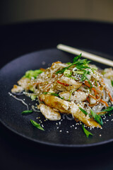 fried chicken with vegetables. thai and chinese food