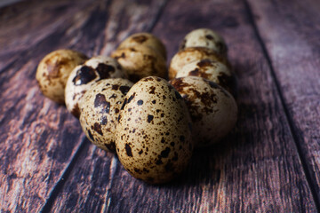 quail eggs on a wooden table macro photography