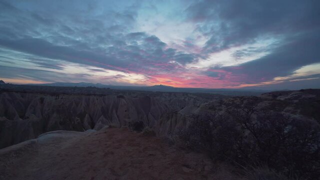 Amazing sunset view of fairy chimneys in Cappadocia. 4K Footage in Turkey.