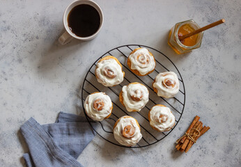 Sweet cinnamon buns with glaze. Pastries. Breakfast.