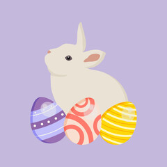 Decorated colorful Easter eggs with a cute white bunny.  