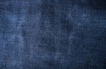 Fototapeta na wymiar Macro shot of blue denim, jean. Modern dress textile, detailed fashion material.