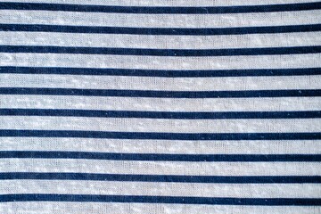 White and blue striped pattern texture background. Linen cotton macro shot, decorative woven.