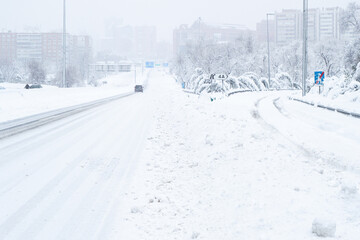 Fototapeta premium Madrid highways and roads covered with snow during the historical Snowtorm over Madrid city, Spain.