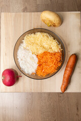 chopped and whole root vegetables on the table