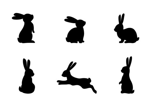 Set of different bunnies silhouettes for design use. Silhouettes of rabbits isolated on a white background.