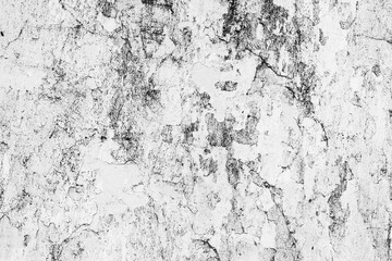 Texture of a concrete wall with cracks and scratches which can be used as a background