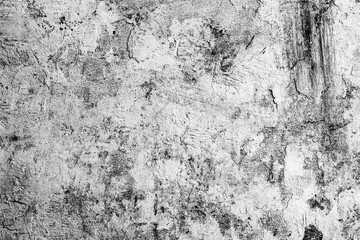 Texture of a concrete wall with cracks and scratches which can be used as a background