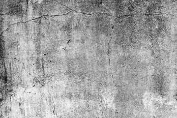 Texture of a concrete wall with cracks and scratches which can be used as a background