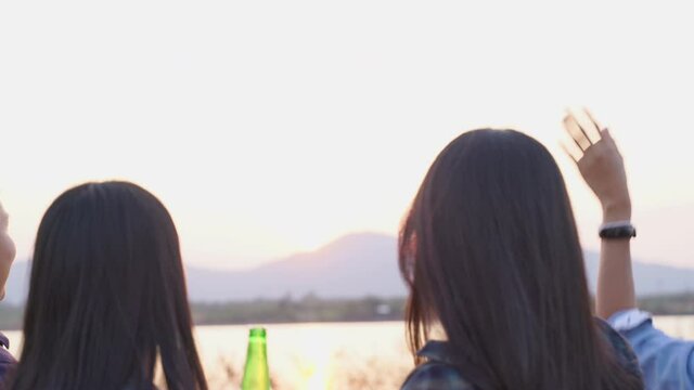 Close Up Hand Asian Teenage Friends Wave Their Hands To Say Goodbye Sunset At Tent Camping Party