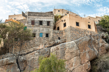 Fototapeta na wymiar Old houses of mountain village Misfat Al Abriyeen in Sultanate of Oman.