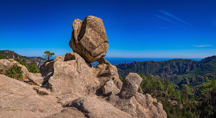 Balanced rock  "Rocher Sentinelle" on a plateau above the Alta Rocca mountain range, Corse, France