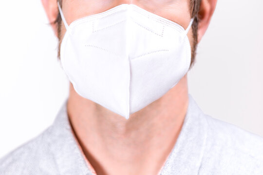 Man wearing white FFP2 Face Mask - COVID protection