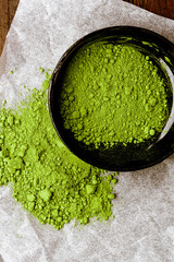 Matcha tea powder in a bowl view from above