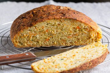 A round loaf of homemade Zucchini and Carrot Bread