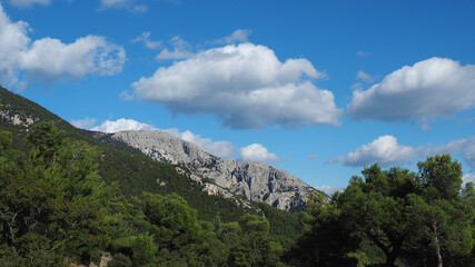 Beautiful mountain of Parnitha on a winter cloudy morning with clear blue sky, Attica, Greece