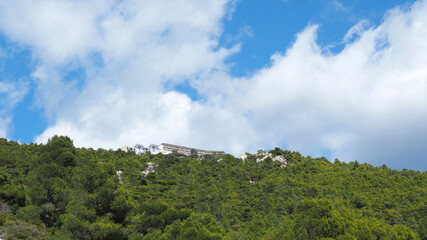 Fototapeta na wymiar Beautiful mountain of Parnitha on a winter cloudy morning with clear blue sky, Attica, Greece