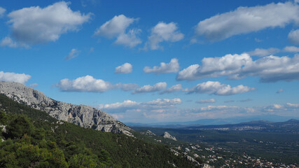 Obraz premium Beautiful mountain of Parnitha on a winter cloudy morning with clear blue sky, Attica, Greece