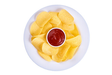 potato chips on a ceramic plate with  ketchup isolated on a white background, top view.