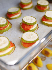 zucchini and tomatoes in the oven, baked fresh vegetables. vegetarian food, healthy dinner, vegetables for lunch, detox, diet, bake, cook at home, good nutrition, diet, fiber