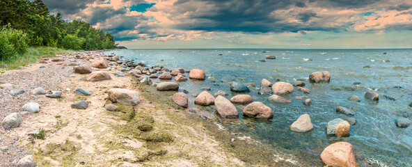 Panorama of stone coastal landscape at the Baltic Sea, seascape for concept of ecological tourism