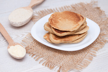 Healthy breakfast concept. Gluten free pancakes from corn and oat flour.