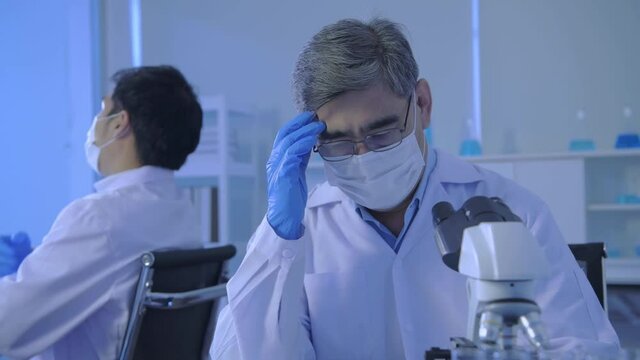 Research concept of 4k resolution. Scientists are stressed about laboratory research.
