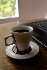 Delicious coffee and elegant computer