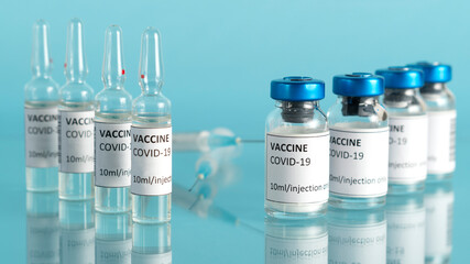 Coronavirus sars-cov-2 vaccine. Covid-19 vaccination with vaccine bottle and ampoules. Injection tool for corona immunization treatment. Vaccine to fight against pandemic. Horizontal orientation.