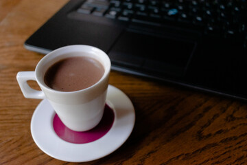 Hot chocolate in brown table