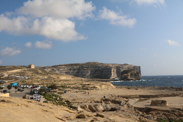 Fototapeta na wymiar Holiday at steep coast of San Lawrenz, Gozo Malta