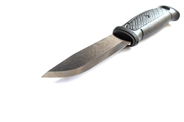 Knife lying at an angle. Knife underneath on a white background.