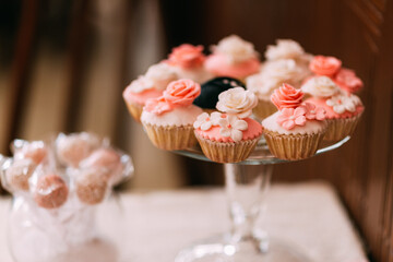 cupcakes on a tray with flowers