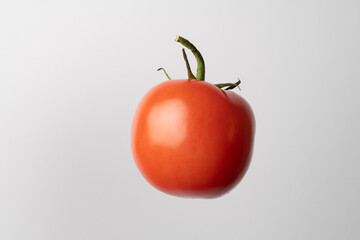 Tomato shot in the studio on a white background