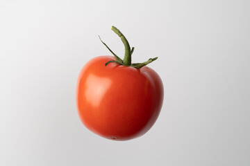 Tomato shot in the studio on a white background