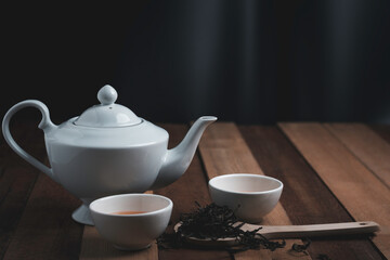 tea cup suit, with copy space for text wodden background