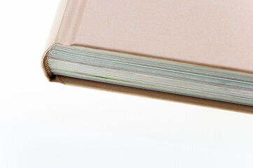 Closeup Of A Brown Book On White Background