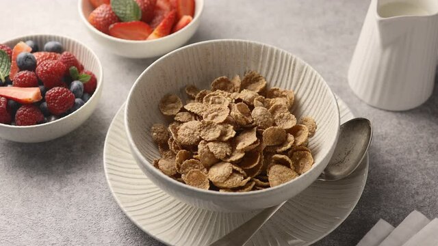 Multigrain cereal poured into a breakfast bowl, close-up 