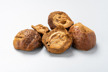 side view ChaoChuanLianZi or Toosendan Fructus or Fried Szechwan Chinaberry Fruit