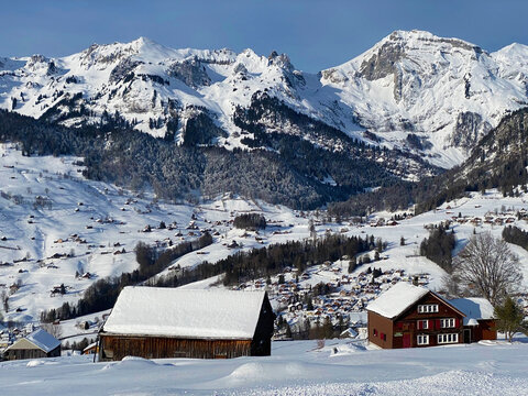 A view of the perfect winter landscape of the Thur river valley between the Churfirsten and Alpstein mountain ranges, Wildhaus - Canton of St. Gallen, Switzerland (Schweiz)
