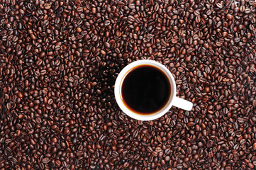 Coffee beans and coffee cup
