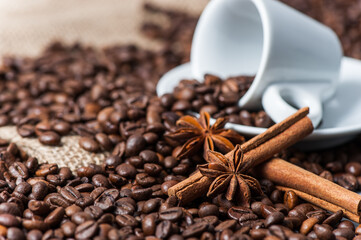 Coffee Cup Surrounded By Coffee Beans Decorated With Cinnamon And Anise